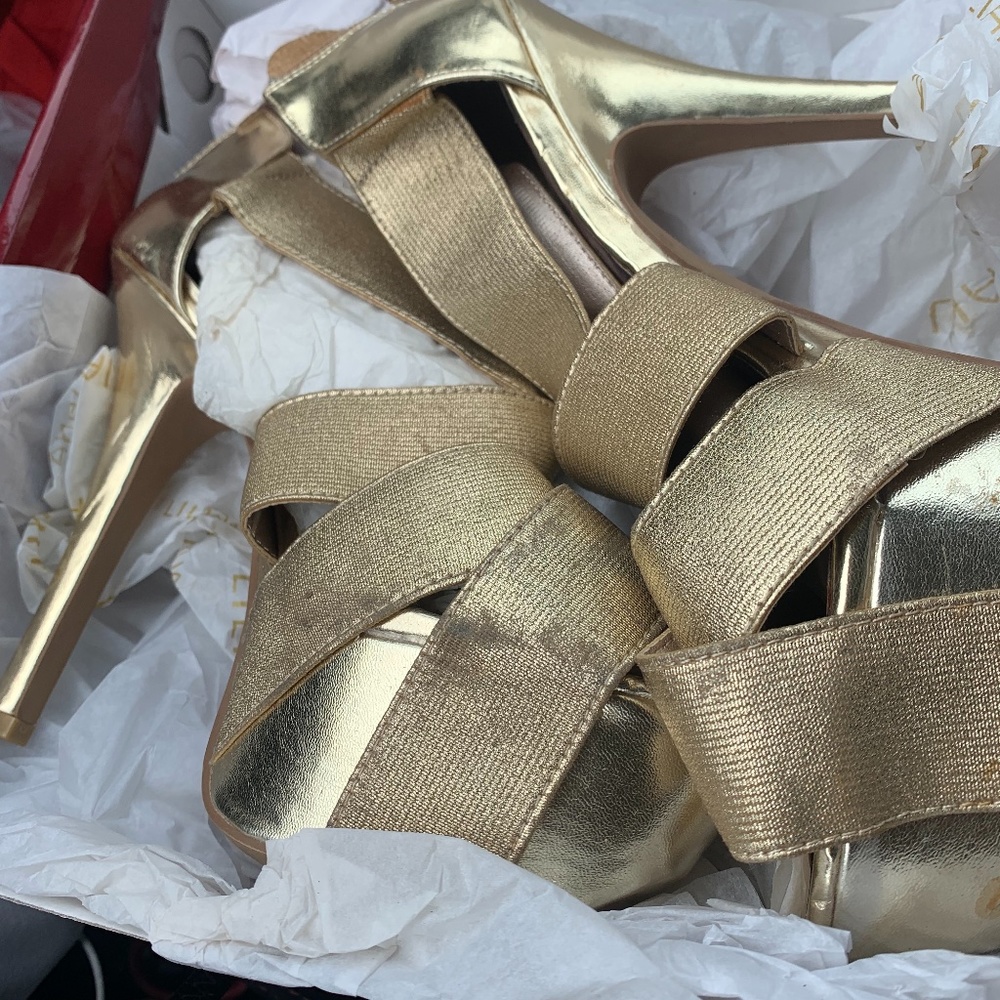 High heeled gold sandals